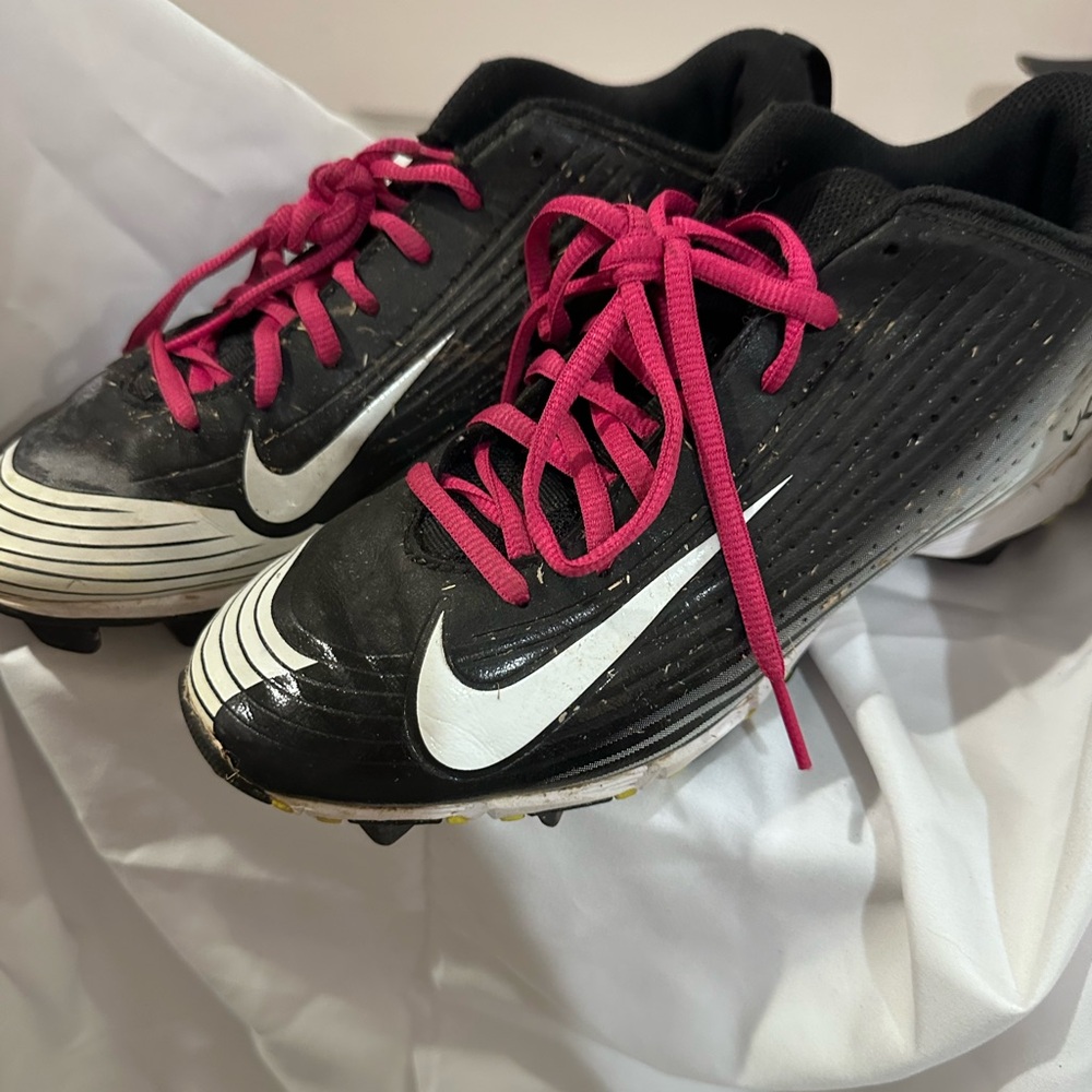 Nike Black and White Baseball Cleats with Pink Accents